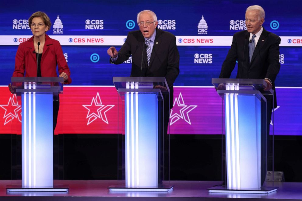 PHOTO: Democratic presidential candidates look on during the Democratic presidential primary debate at the Charleston Gaillard Center, Feb. 25, 2020, in Charleston, South Carolina.