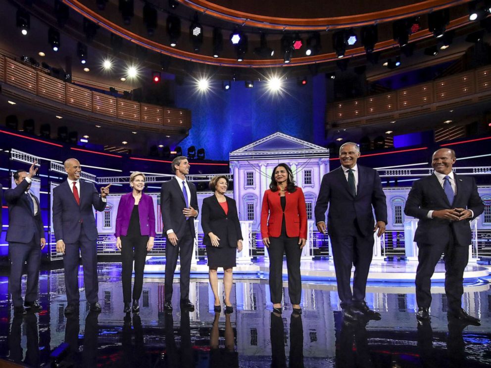 PHOTO: 2020 Democratic presidential candidates take the stage for the first Democratic presidential primary debate for the 2020 election at the Adrienne Arsht Center for the Performing Arts, June 26, 2019 in Miami.