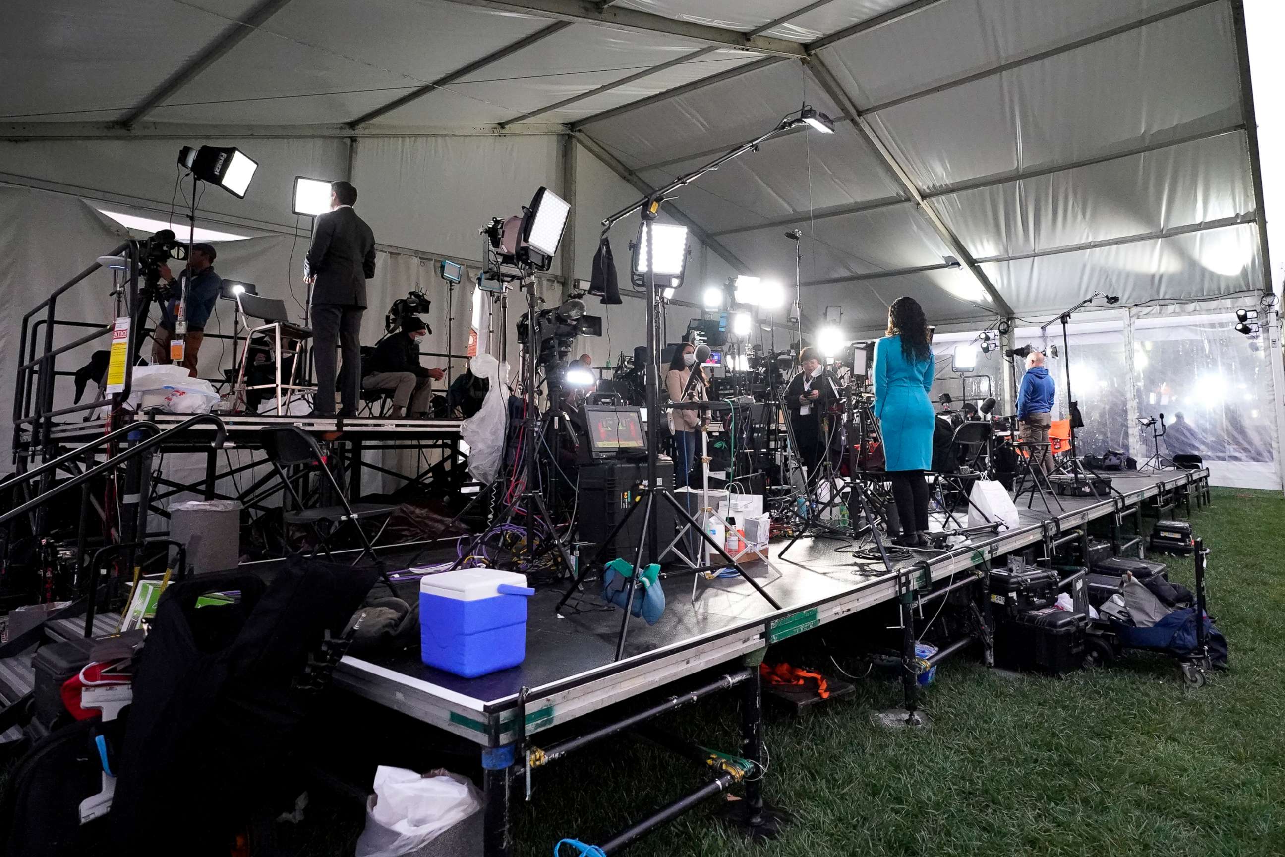 PHOTO: Broadcast journalists stand inside a tent outside Case Western Reserve University ahead of the first presidential debate between President Donald Trump and Democratic candidate former Vice President Joe Biden, Sept. 29, 2020, in Cleveland.