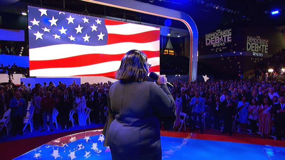 PHOTO: Breanna Lindsey, 20, sings the national anthem at the Democratic presidential primary debate hosted by ABC News in Houston, Sept. 12, 2019.