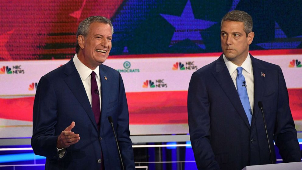 PHOTO: Mayor of New York City Bill de Blasio speaks as Tim Ryan looks on as they participate in the first Democratic primary debate hosted by NBC News at the Adrienne Arsht Center for the Performing Arts in Miami, Florida, June 26, 2019.