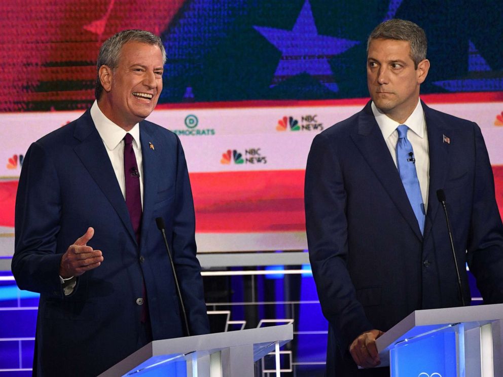 PHOTO: Mayor of New York City Bill de Blasio speaks as Tim Ryan looks on as they participate in the first Democratic primary debate hosted by NBC News at the Adrienne Arsht Center for the Performing Arts in Miami, Florida, June 26, 2019.