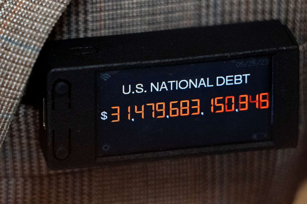 PHOTO: Rep. Thomas Massie wears a digital pin simulating the increasing U.S. National Debt, at the Capitol in Washington, May 30, 2023.