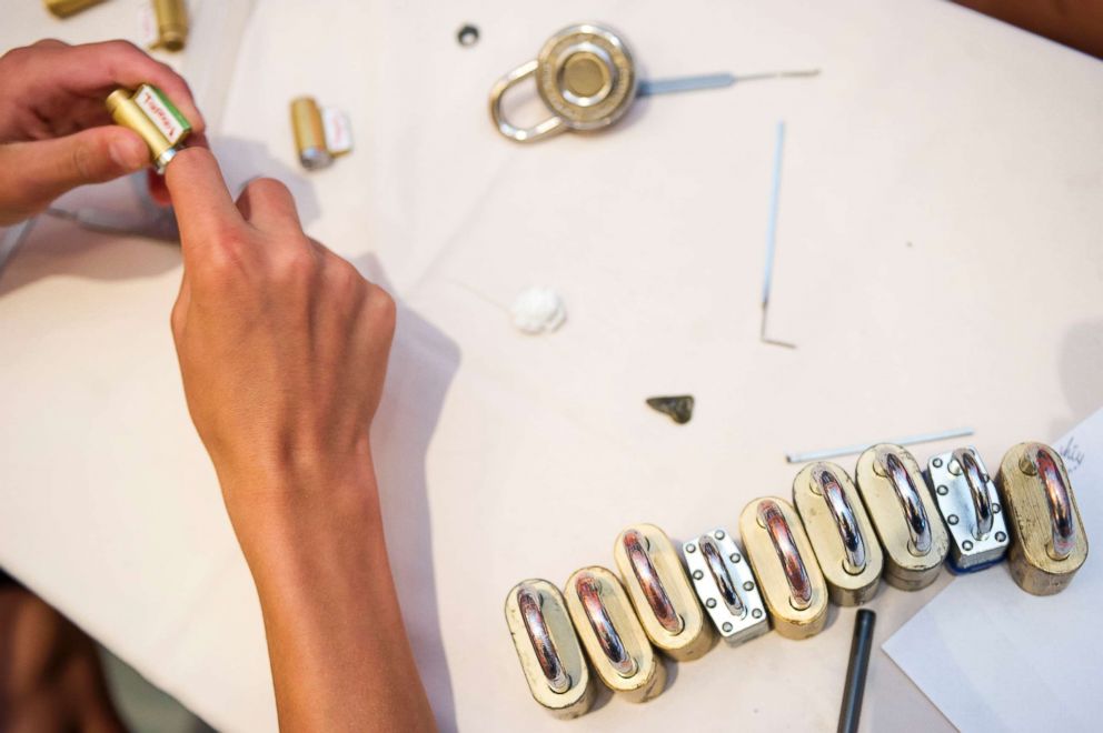 PHOTO: Kids work at the lock picking station at r00tz Asylum, a program for kids at DEF CON 24, one of the world's largest hacker conventions in Bally's Hotel & Casino on Aug. 6, 2016 in Las Vegas.