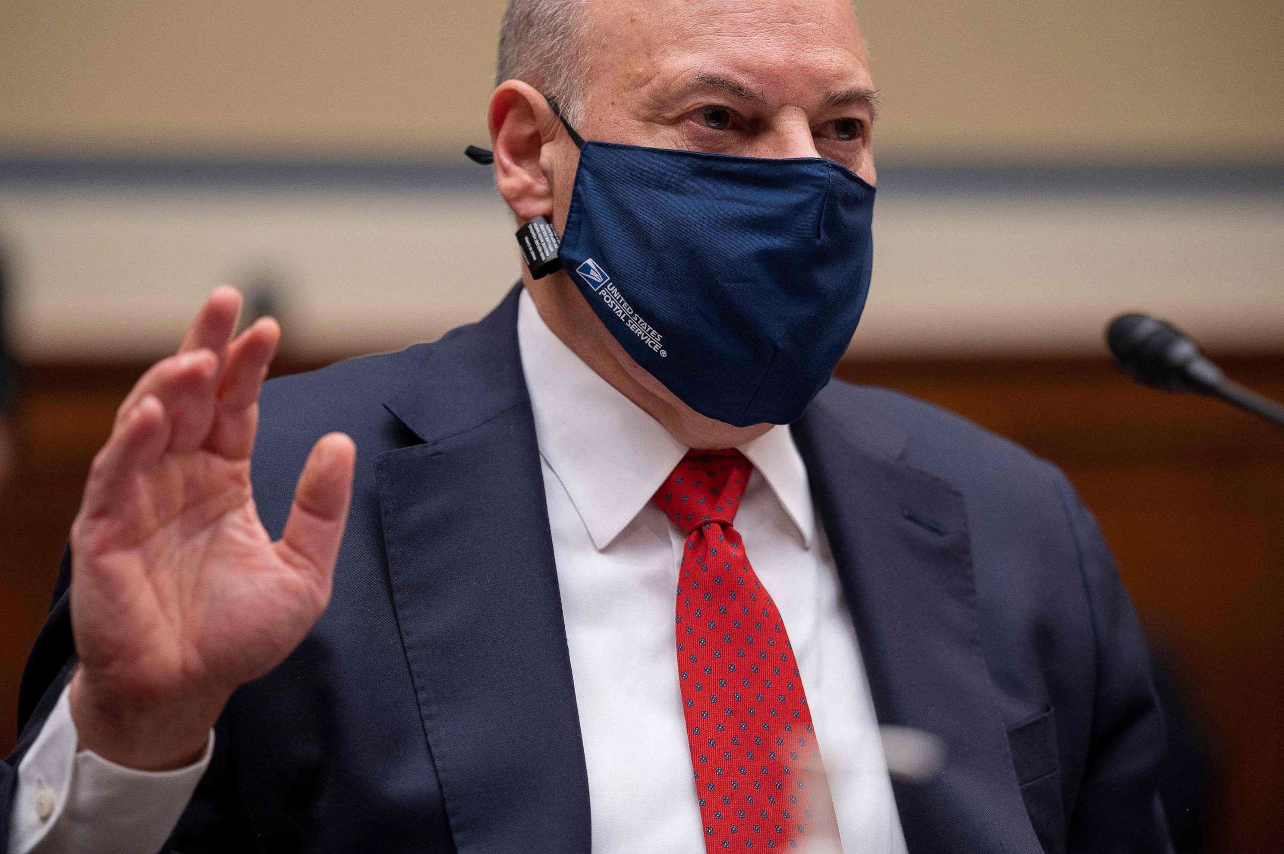 PHOTO: United States Postal Service Postmaster General Louis DeJoy is sworn in during a House Oversight and Reform Committee hearing on Legislative Proposals to Put the Postal Service on Capitol Hill in Washington, D.C, on Feb. 24, 2021.