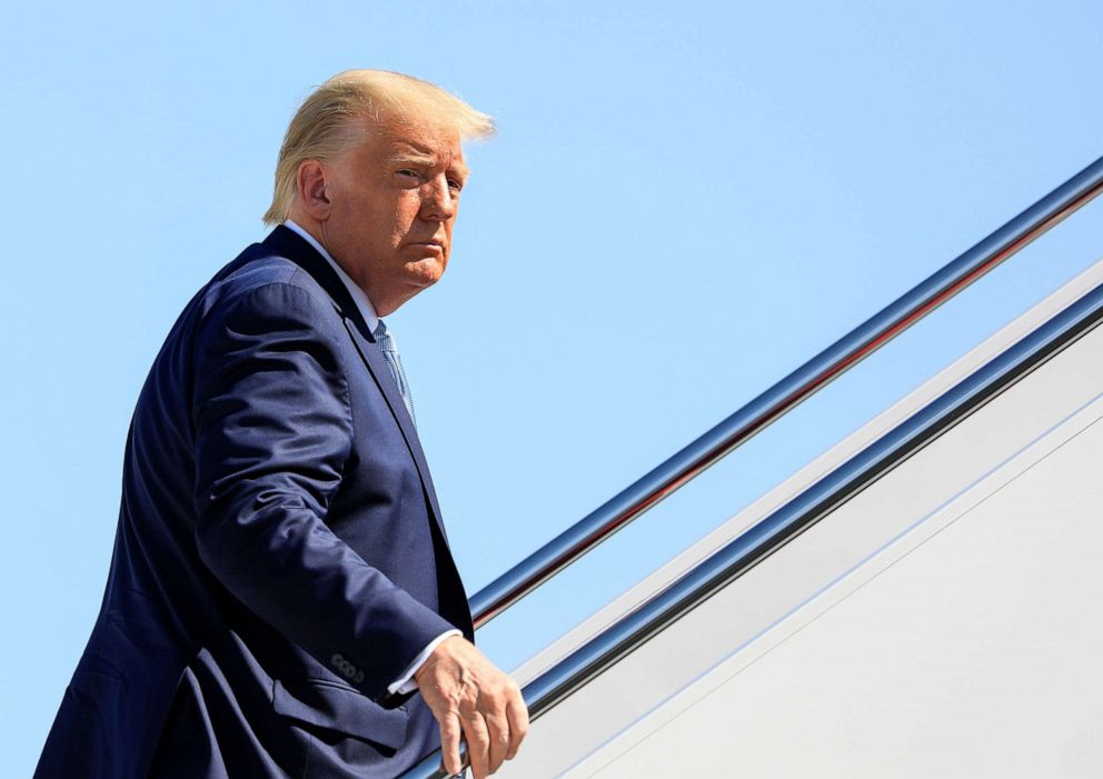 PHOTO: U.S. President Donald Trump boards Air Force One as he departs on travel to Iowa and Arizona at Joint Base Andrews, Md., Aug. 18, 2020. 