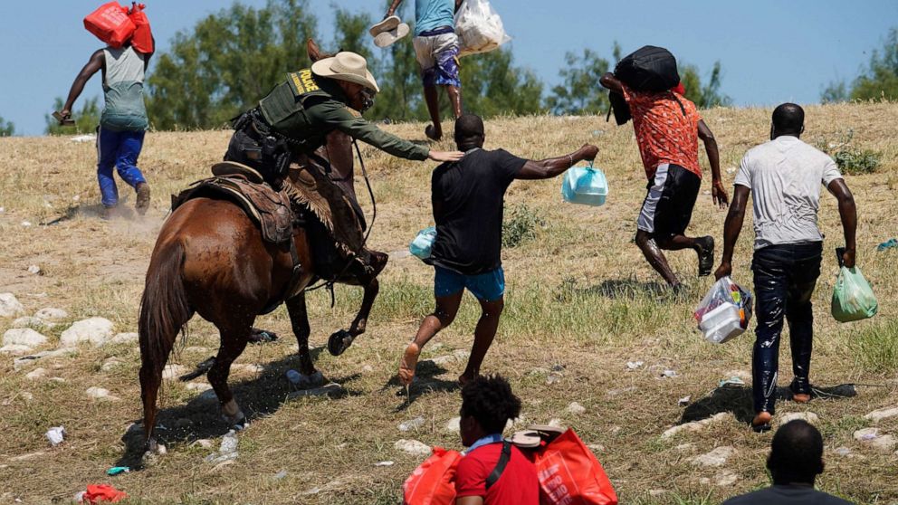PHOTO: A United States Border Patrol agent on horseback tries to stop Haitian migrants from entering an encampment on the banks of the Rio Grande near the Acuna Del Rio International Bridge in Del Rio, Texas, Sept. 19, 2021.