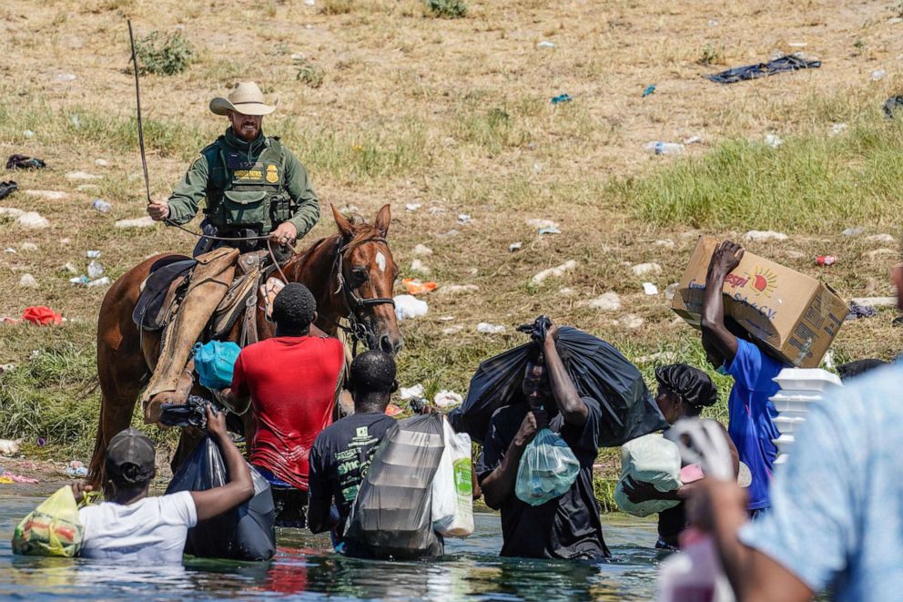 PHOTO: A United States Border Patrol agent on horseback tries to stop Haitian migrants from entering an encampment on the banks of the Rio Grande near the Acuna Del Rio International Bridge in Del Rio, Texas, Sept. 19, 2021.