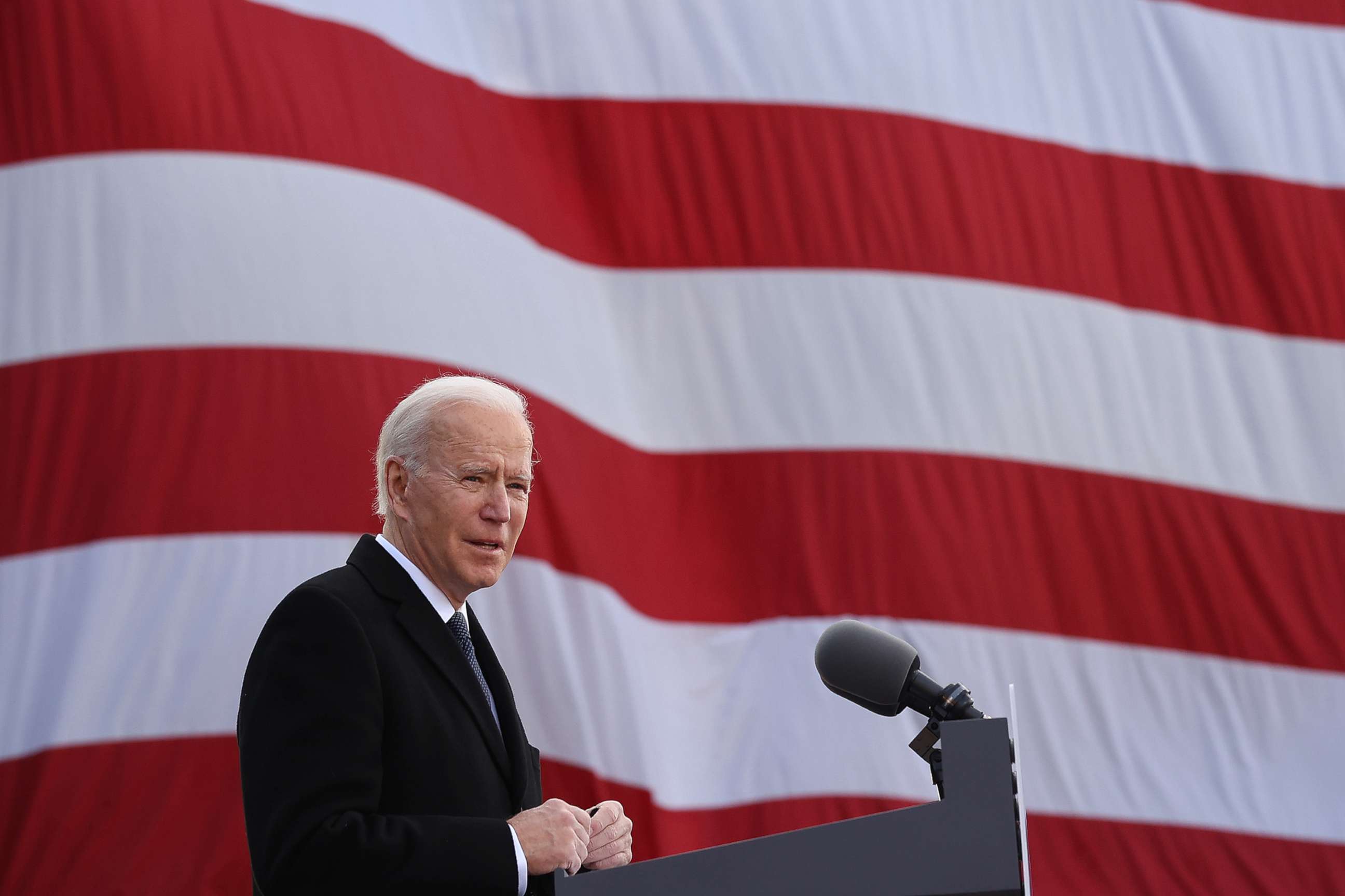 PHOTO: One day before being inaugurated as the 46th president of the United States, President-elect Joe Biden delivers remarks at the Major Joseph R. "Beau" Biden III National Guard/Reserve Center, Jan. 19, 2021, in New Castle, Del. 