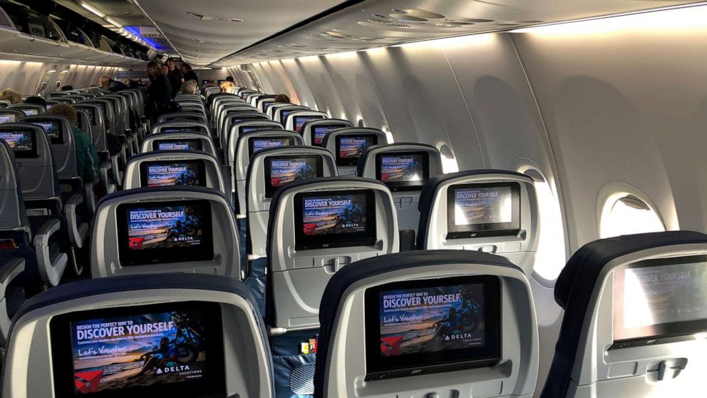 PHOTO: Video screens are shown built into the backs of passenger seats on board a Delta Airlines Boeing 737-900ER aircraft in San Diego, Jan. 10, 2018.