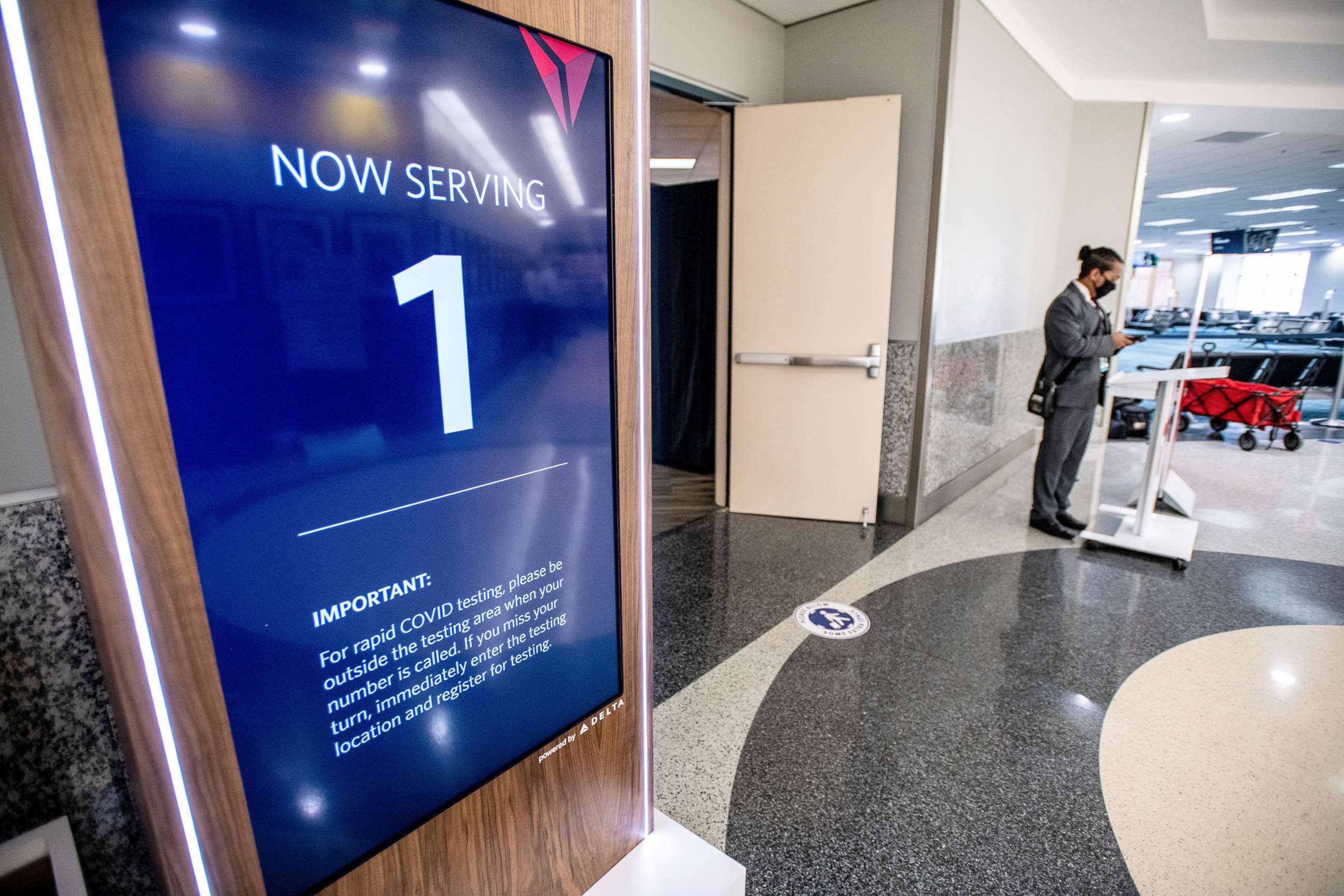 PHOTO: Delta Air is conducting a three week pilot testing program allows U.S. travelers flying for essential reasons to fly from Atlanta to Amsterdam and Rome without having to quarantine when they arrive, Atlanta Dec. 15, 2020. 