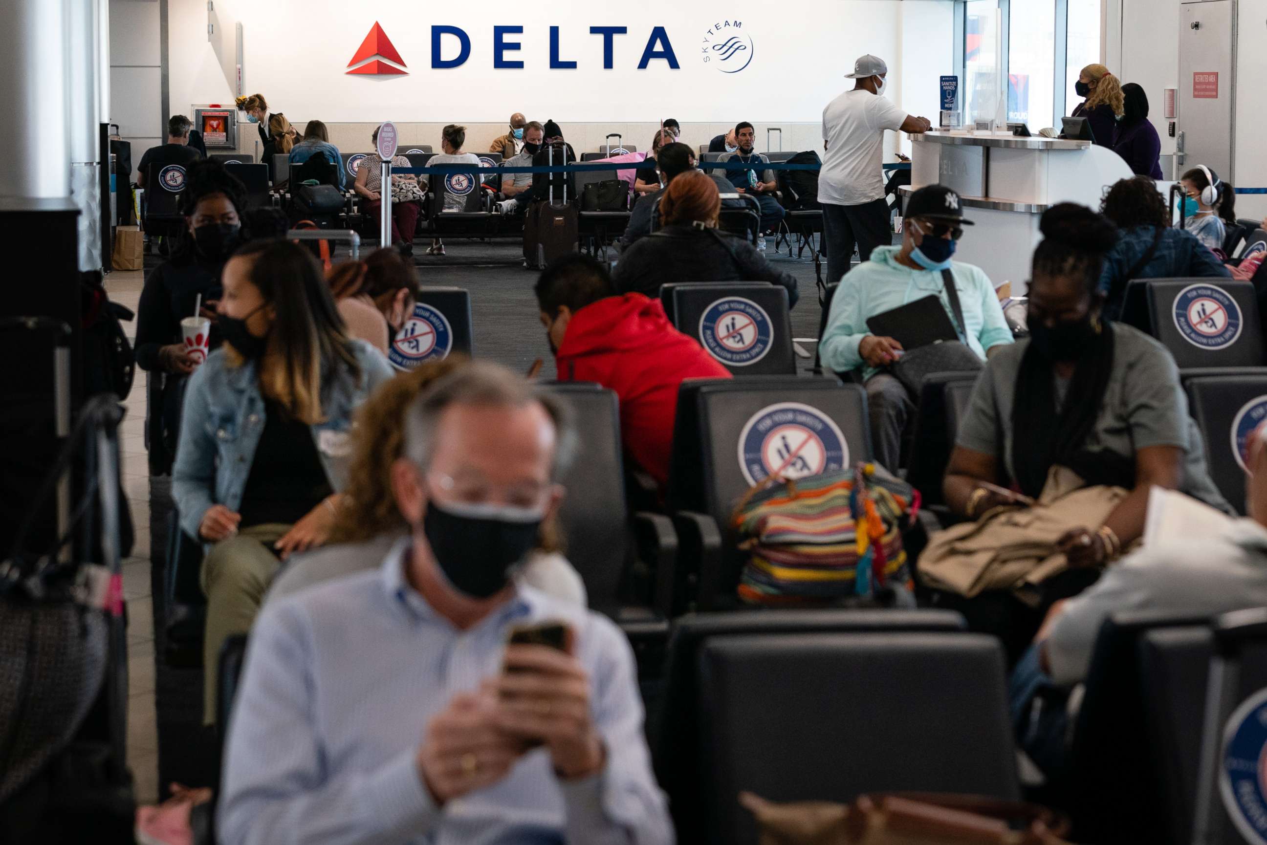 PHOTO: Passengers wait to board a Delta Air Lines flight at Hartsfield-Jackson Atlanta International Airport in Atlanta on April 7, 2021.