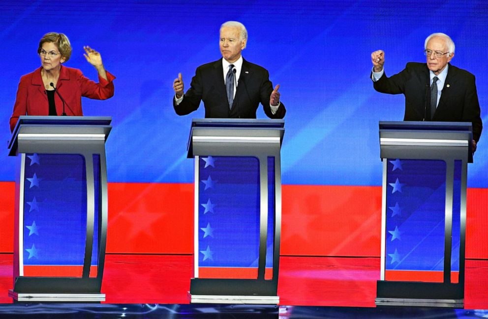 PHOTO: Sen. Elizabeth Warren, former Vice President Joe Biden and Sen. Bernie Sanders on stage for the Democratic Debate in New Hampshire hosted by ABC News, on Feb. 7, 2020.