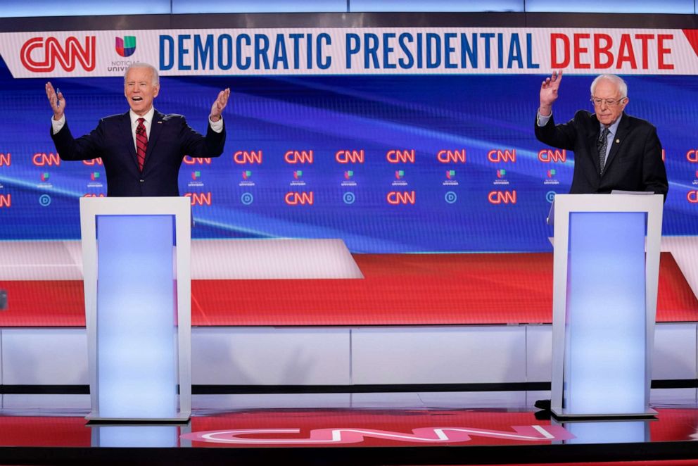 PHOTO: Former Vice President Joe Biden, left, and Sen. Bernie Sanders, right, participate in a Democratic presidential primary debate at CNN Studios in Washington, March 15, 2020.