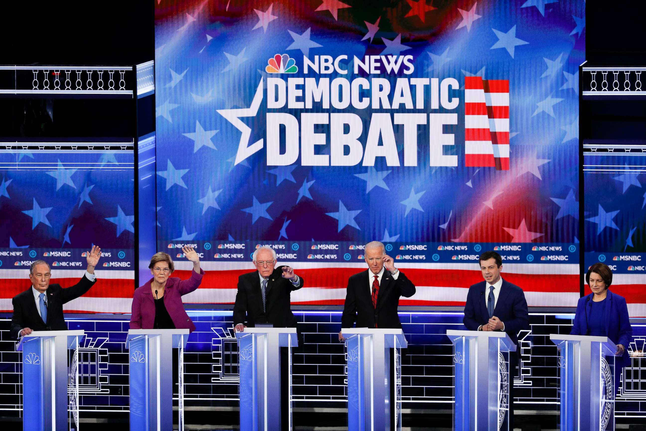 PHOTO: Democratic presidential candidates stand on stage before a Democratic presidential primary debate, Feb. 19, 2020, in Las Vegas, hosted by NBC News and MSNBC.