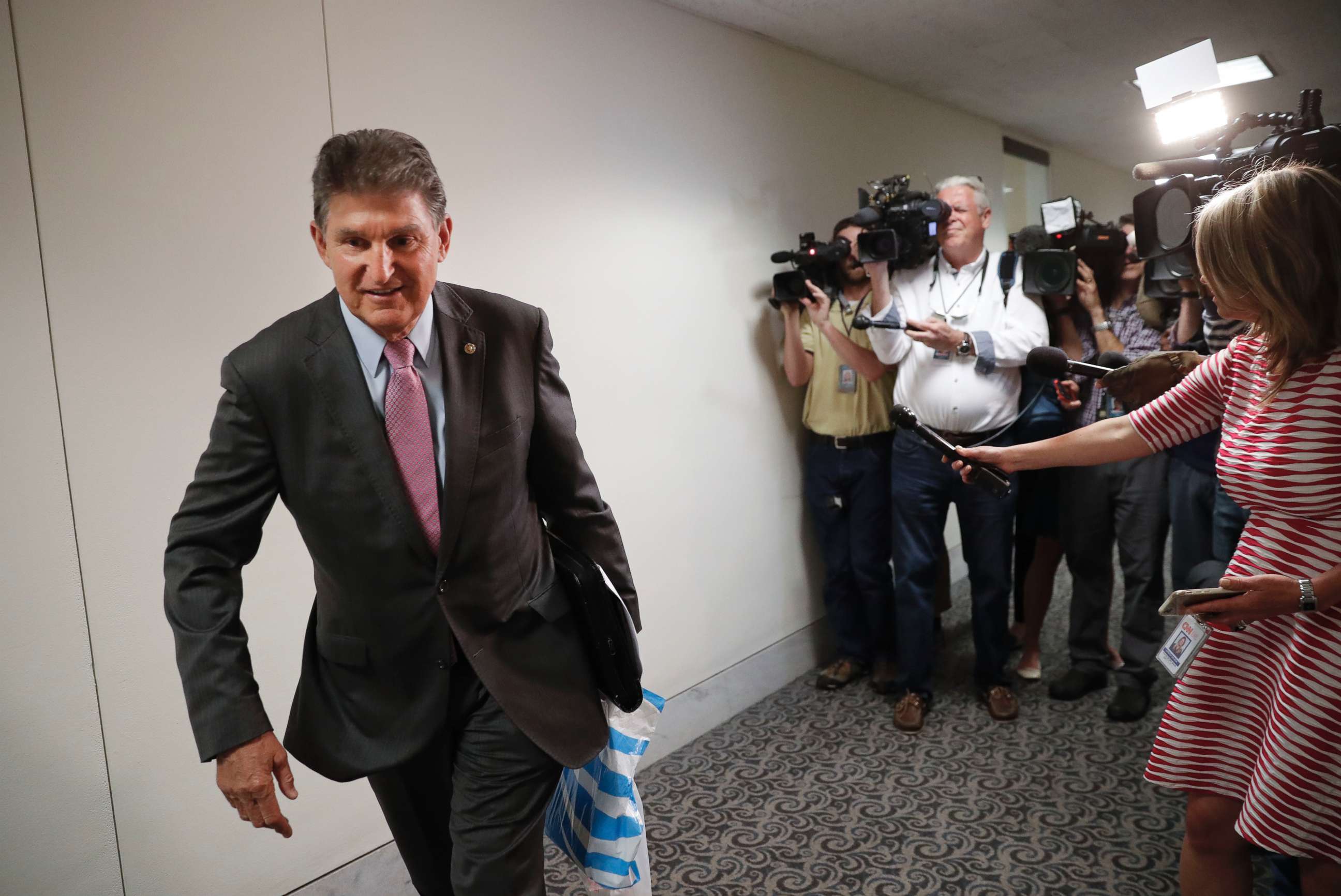 PHOTO: Sen. Joe Manchin, turns to walk away after speaking to members of the media prior to his meeting with CIA Director Nominee Gina Haspel, on Capitol Hill in Washington, May 7, 2018.