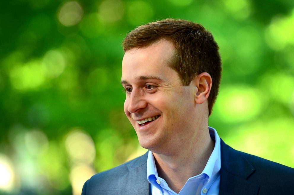 PHOTO: Ninth Congressional district Democratic candidate Dan McCready smiles outside Eastover elementary school in Charlotte, N.C., May 8, 2018.