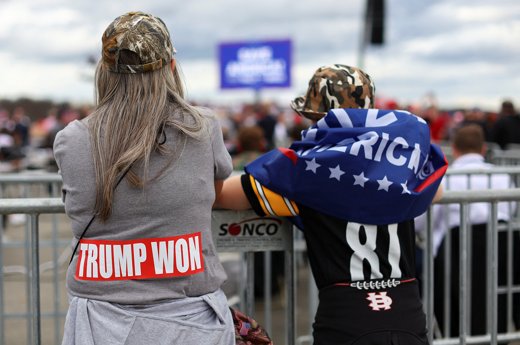 PHOTO: People stand ahead of a pre-election rally held by former U.S. President Donald Trump in support of Republican candidates in Latrobe, Pa., Nov. 5, 2022. 