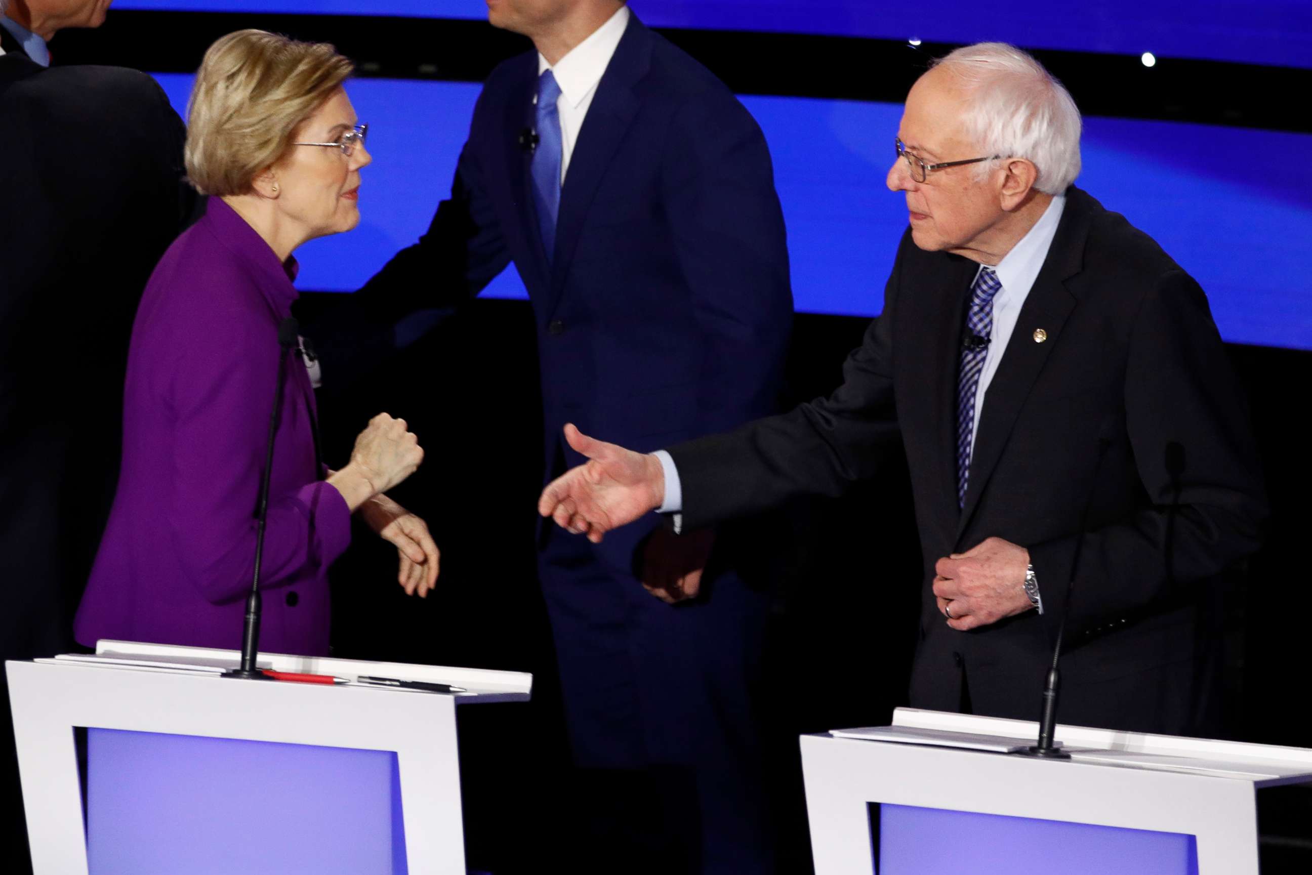 PHOTO: Sen. Elizabeth Warren and Sen. Bernie Sanders greet each other at the close of a Democratic presidential primary debate hosted by CNN and the Des Moines Register in Des Moines, Iowa, Jan. 14, 2020.