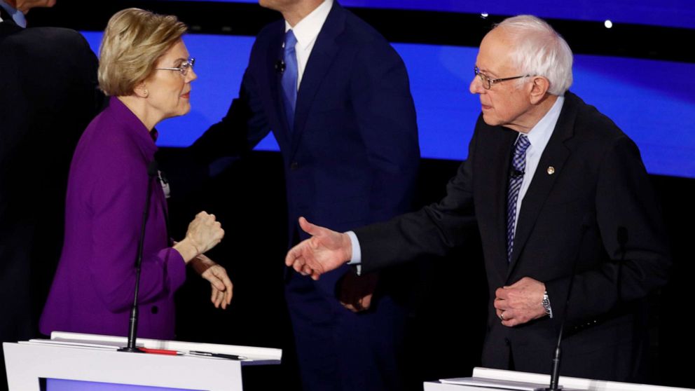PHOTO: Sen. Elizabeth Warren and Sen. Bernie Sanders greet each other at the close of a Democratic presidential primary debate hosted by CNN and the Des Moines Register in Des Moines, Iowa, Jan. 14, 2020.