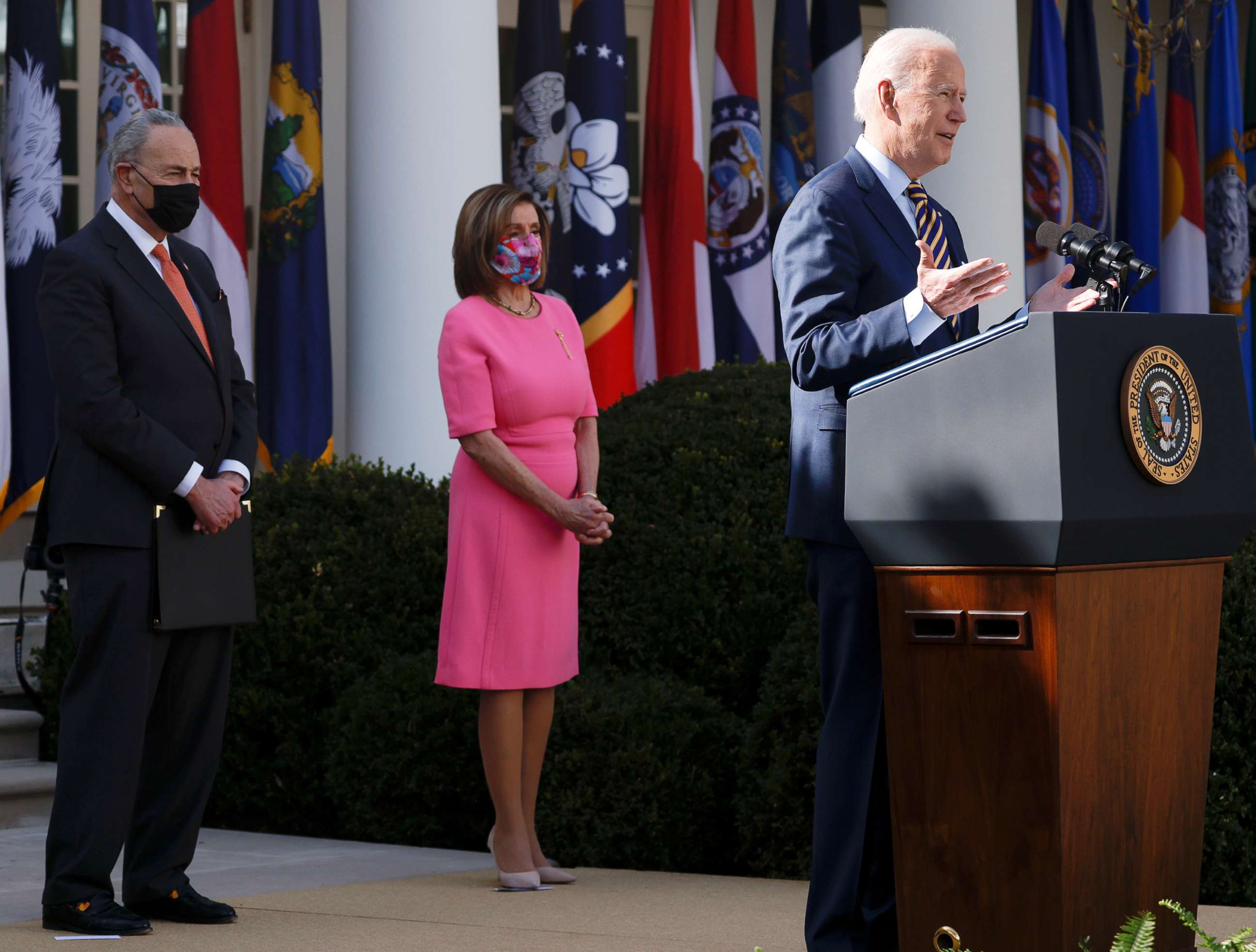 PHOTO: President Joe Biden speaks as Senate Majority Leader Chuck Schumer and House Speaker Nancy Pelosi attend a press conference in the Rose Garden of the White House in Washington, March 21, 2021.