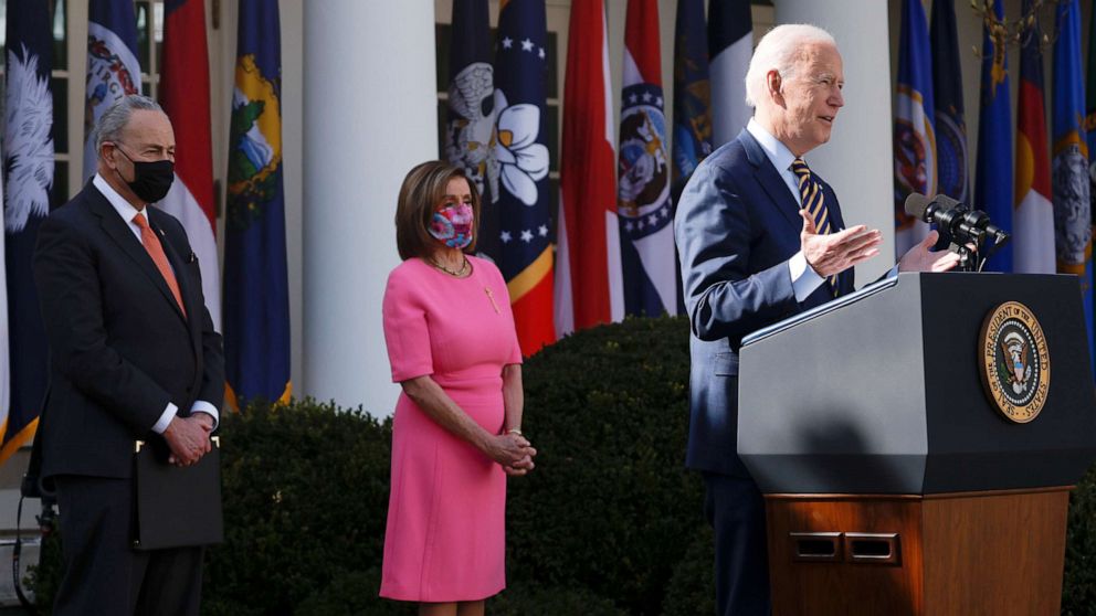 PHOTO: President Joe Biden speaks as Senate Majority Leader Chuck Schumer and House Speaker Nancy Pelosi attend a press conference in the Rose Garden of the White House in Washington, March 21, 2021.