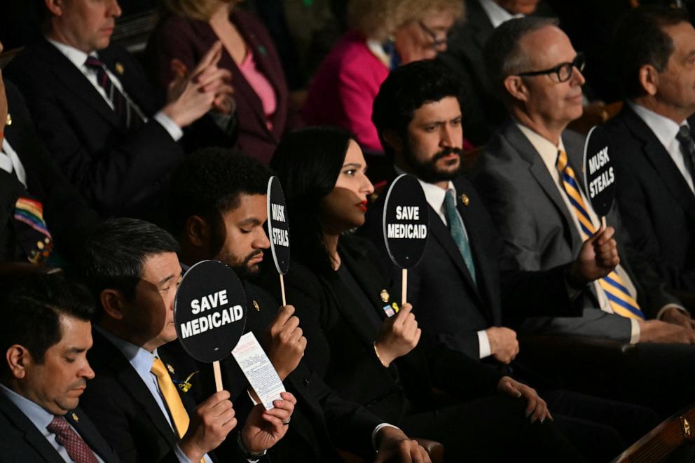 PHOTO: Democratic lawmakers protest as President Donald Trump speaks during an address to a joint session of Congress at the US Capitol in Washington, DC, on March 4, 2025.