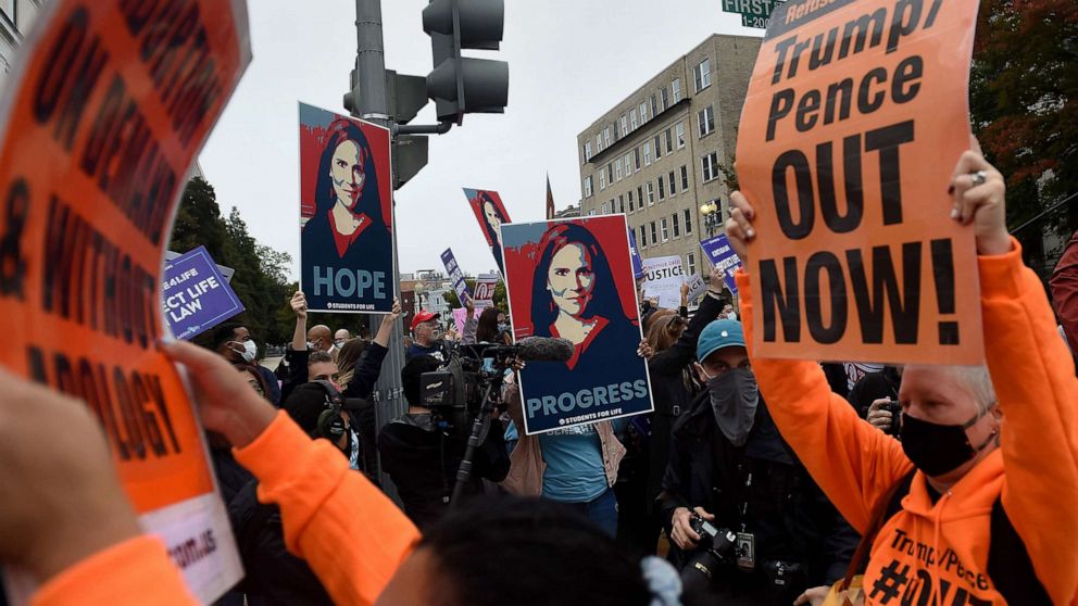 PHOTO: Supporters and protesters of President Donald Trump's Supreme Court nominee, Amy Coney Barrett gather on Capitol Hill on the first day of her nomination hearing on Oct. 12, 2020, in Washington, D.C.