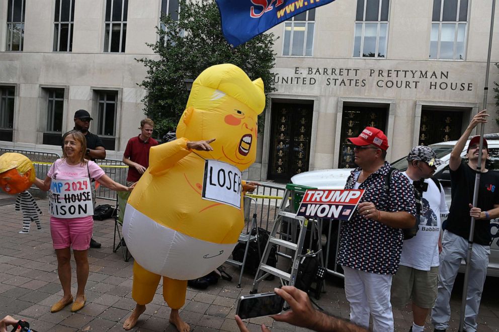 PHOTO: Demonstrators shout anti and pro-Trump slogans in front of the E. Barrett Prettyman United States Courthouse in Washington, D.C., Aug. 3, 2023.
