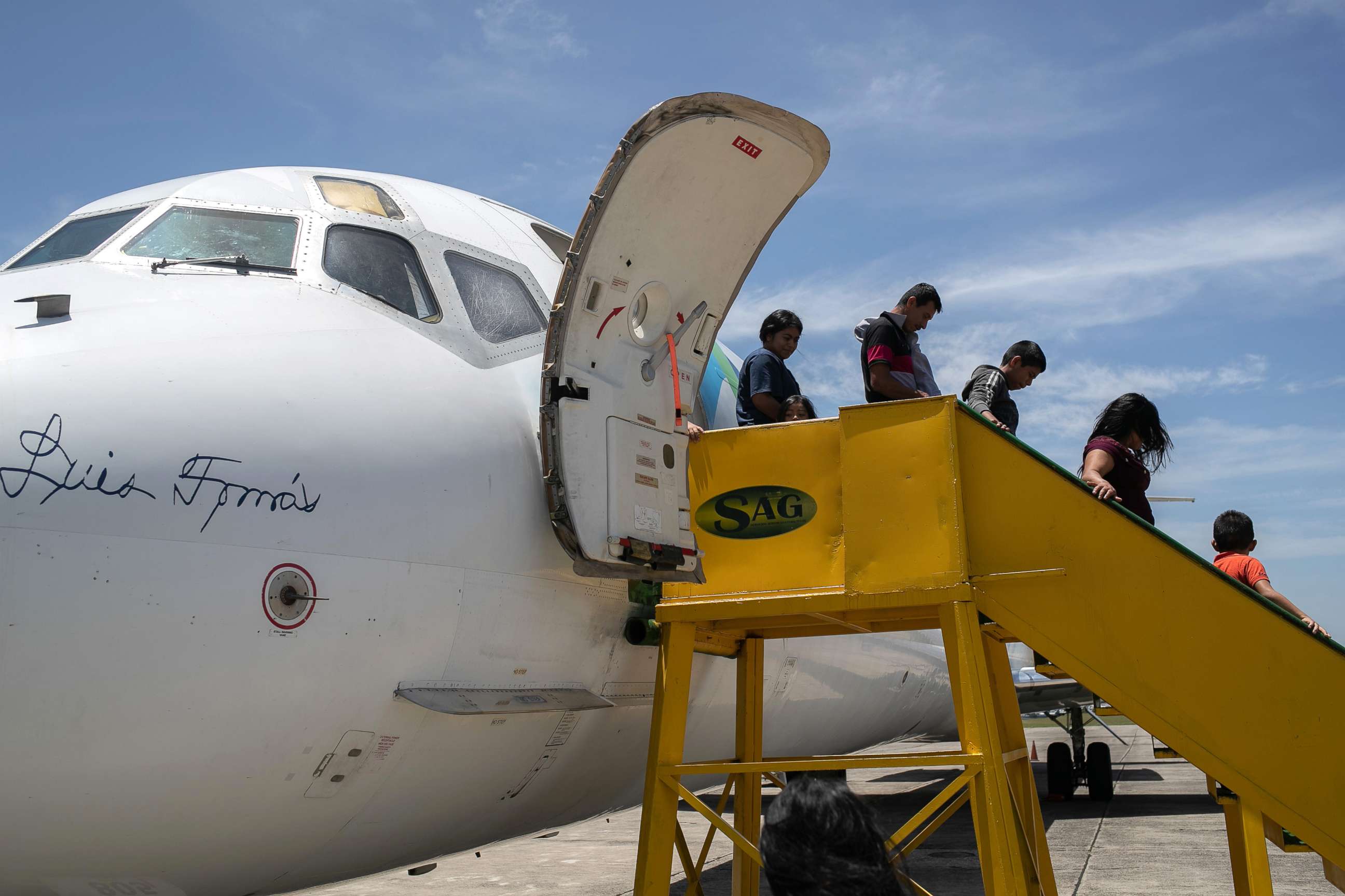 PHOTO: Families arrive on an ICE deportation flight from Brownsville, Texas on Aug. 29, 2019 to Guatemala City.