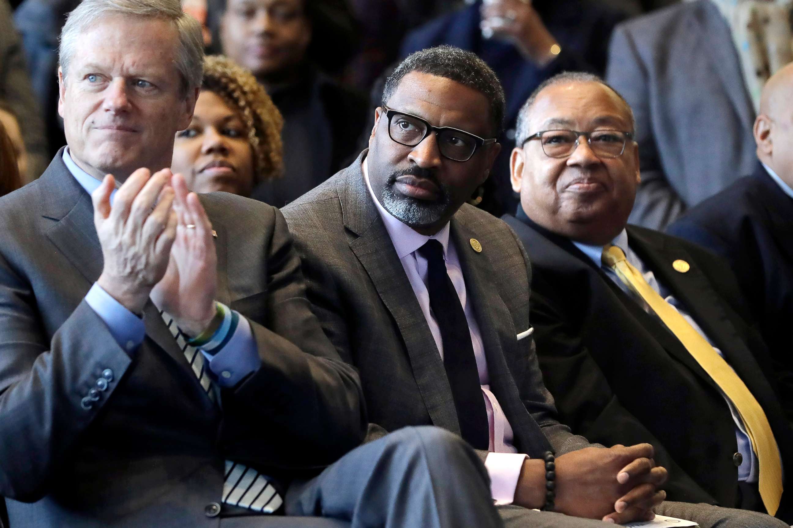PHOTO: National Association for the Advancement of Colored People President Derrick Johnson, center, Massachusetts Gov. Charlie Baker, left, and NAACP Chairman Leon W. Russell, right, look on during a news conference on Dec. 12, 2019, in Boston.