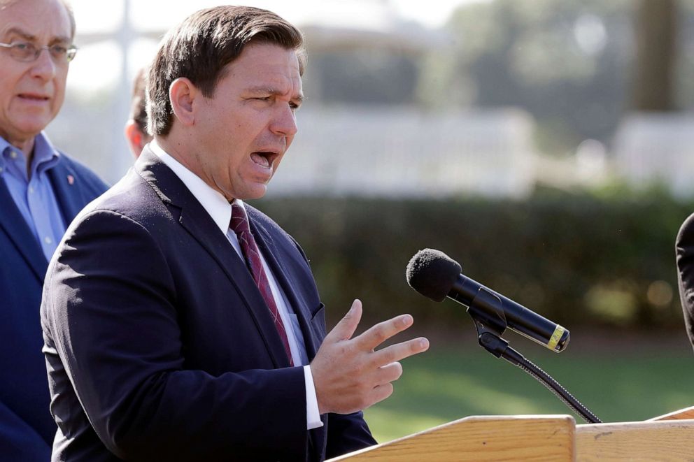 PHOTO: Florida Gov. Ron DeSantis delivers remarks during a press conference at a coronavirus mobile testing site in The Villages, Fla., March 23, 2020. 