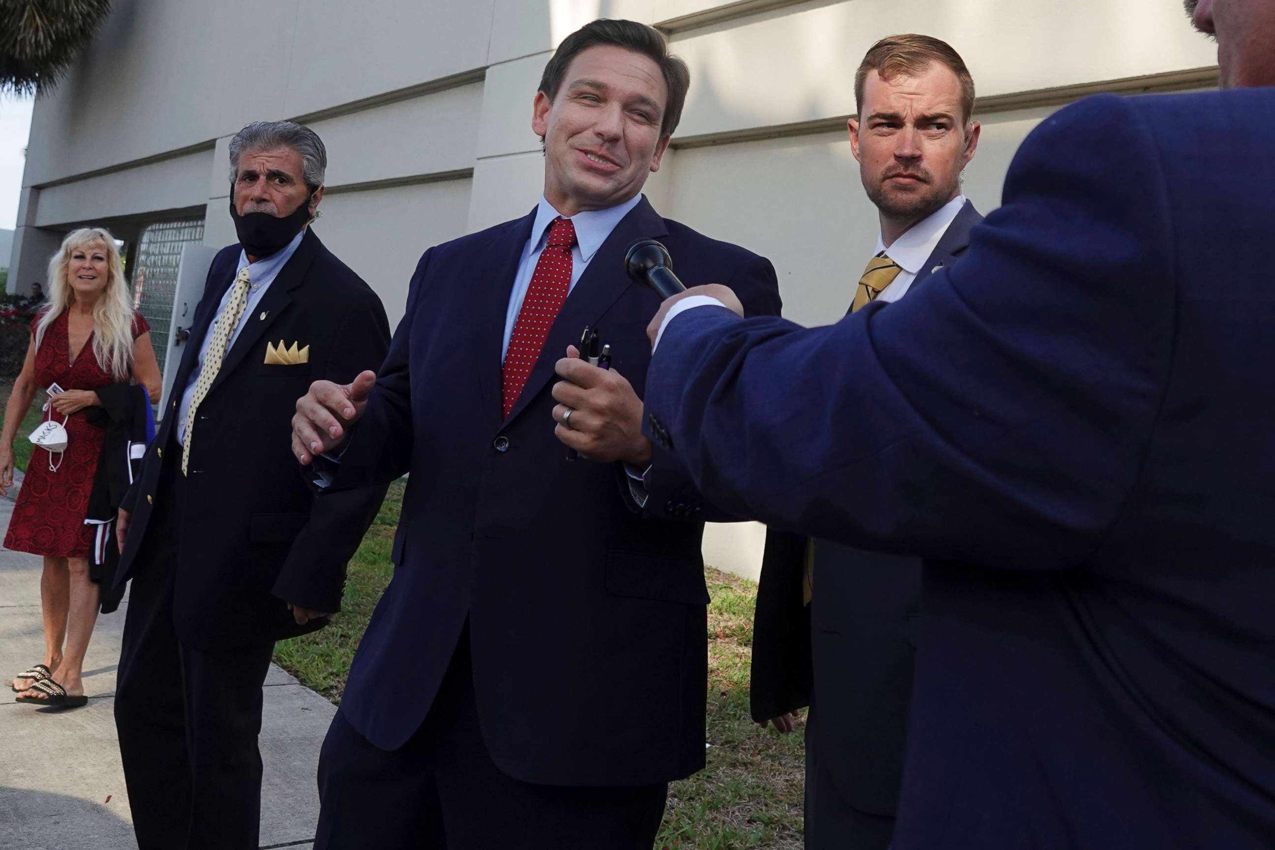 PHOTO: Florida Gov. Ron DeSantis leaves after an appearance, May 6, 2021, in West Palm Beach, Fla.