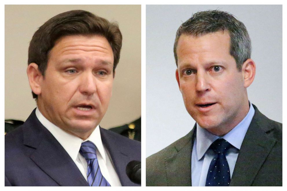 PHOTO: Florida Gov. Ron DeSantis, left, and Hillsborough County State Attorney Andrew Warren during separate news conferences in Tampa, Fla.
