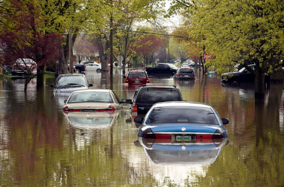 PHOTO: Vehicles are submerged in floodwaters along Currier Street in Dearborn Heights, Mich., May 1, 2019.