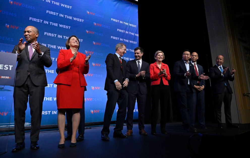 PHOTO: Democratic presidential candidate Deval Patrick, left, stands on stage beside other Democratic candidates during an event in Las Vegas, Nov. 17, 2019.