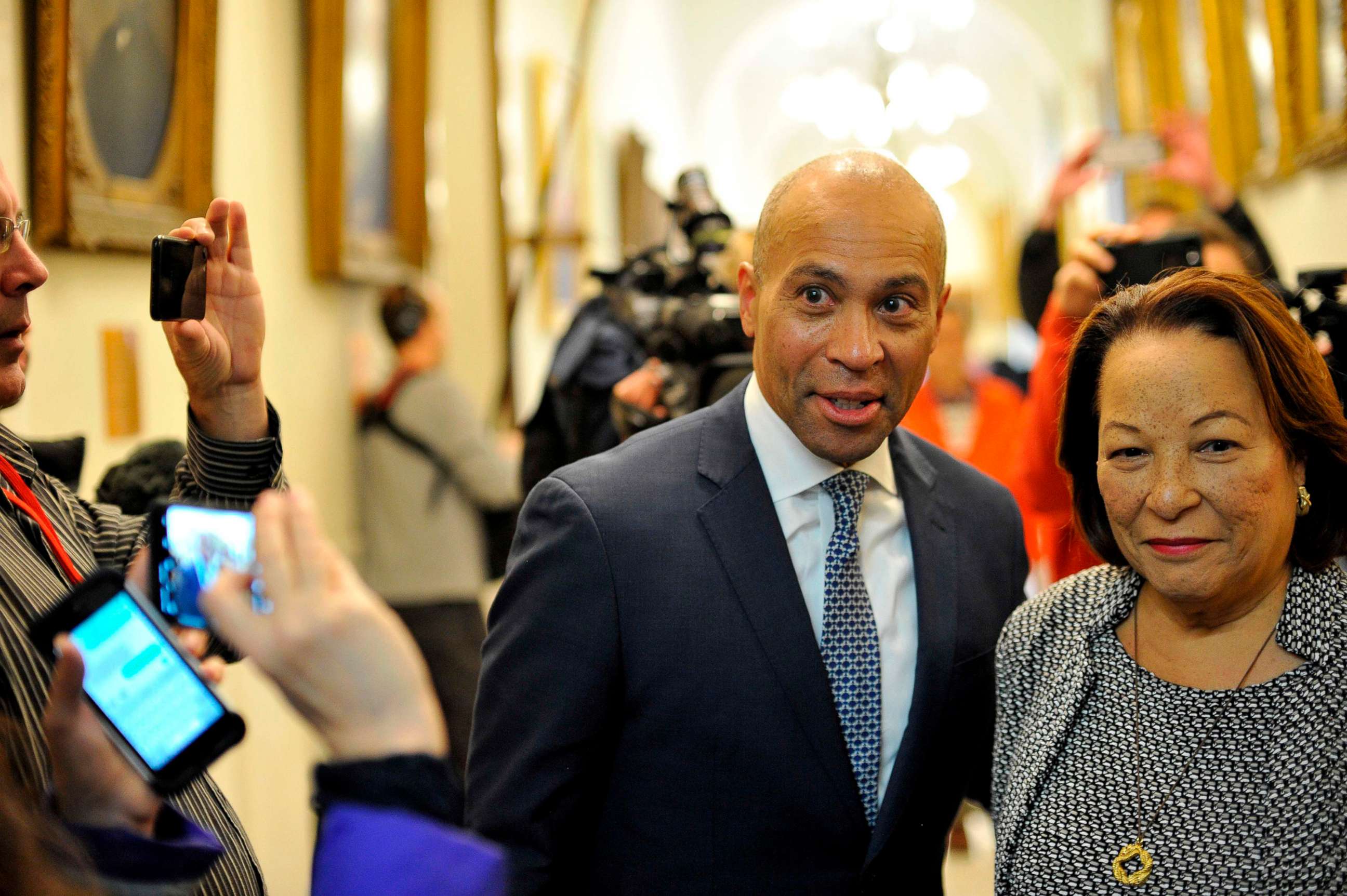PHOTO: Deval Patrick is shown with his wife, Diane, on his way to officially enter the US Presidential race by signing paperwork to join the New Hampshire primary ballot, at the New Hampshire State House on Nov. 14, 2019, in Concord, N.H.