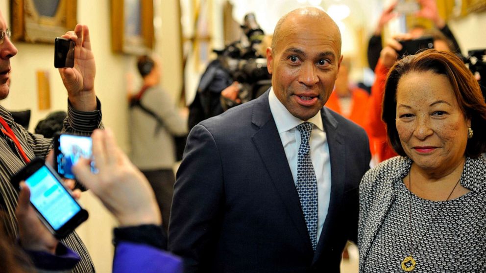 PHOTO: Deval Patrick is shown with his wife, Diane, on his way to officially enter the US Presidential race by signing paperwork to join the New Hampshire primary ballot, at the New Hampshire State House on Nov. 14, 2019, in Concord, N.H.