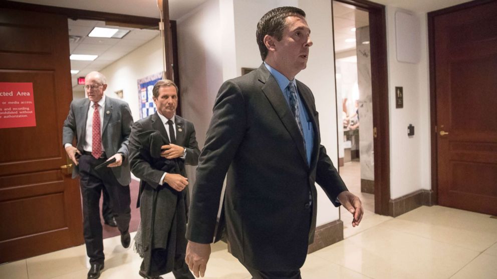 House Intelligence Committee Chairman Devin Nunes, followed by Rep. Chris Stewart and Rep. Mike Conaway, far left, leave the secure area where the panel was wrapping up its inquiry into Russian meddling in the 2016 election, on Capitol Hill in Washington, March 22, 2018.