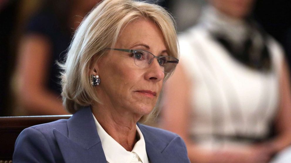 PHOTO: Secretary of Education Betsy DeVos listens during a cabinet meeting in the East Room of the White House, May 19, 2020.