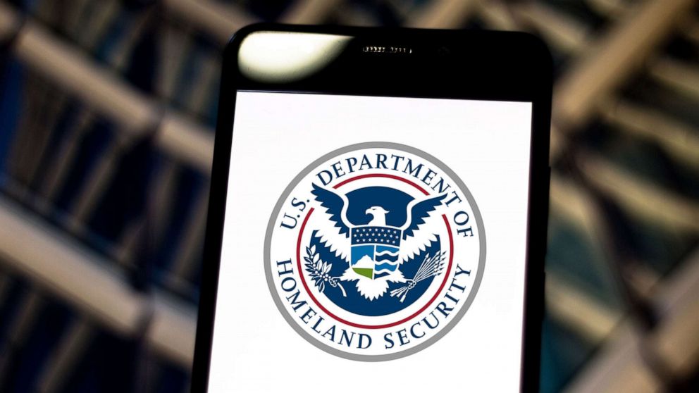PHOTO: In this photo illustration the United States Department of Homeland Security (DHS) logo is seen displayed on a smartphone. 