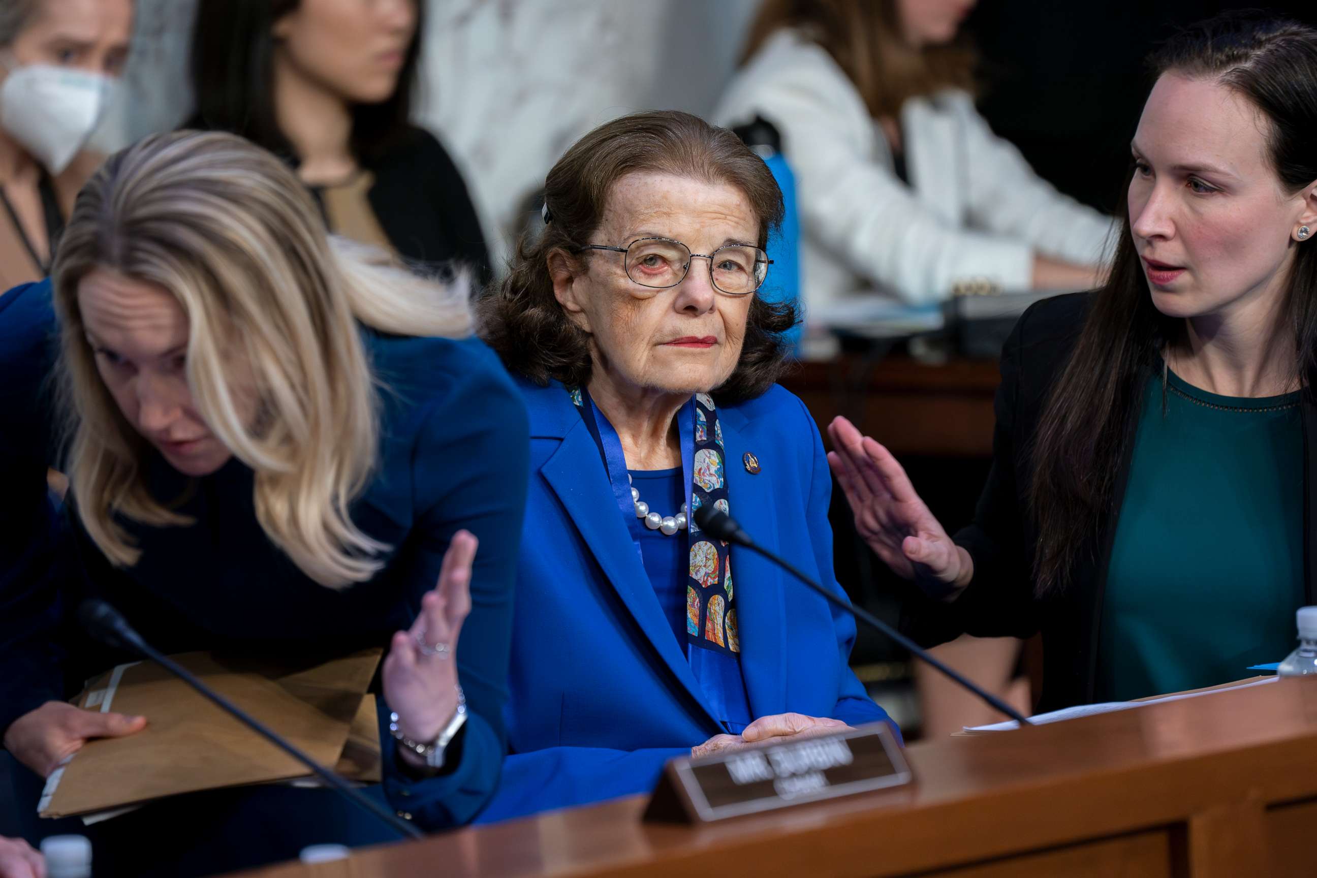 PHOTO: Sen. Dianne Feinstein, D-Calif., is flanked by aides as she returns to the Senate Judiciary Committee following a more than two-month absence as she was being treated for a case of shingles, at the Capitol in Washington, May 11, 2023.