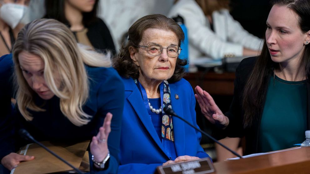 PHOTO: Sen. Dianne Feinstein, D-Calif., is flanked by aides as she returns to the Senate Judiciary Committee after an absence of more than two months while undergoing treatment over a shingles case, at the Capitol in Washington, May.  11, 2023.