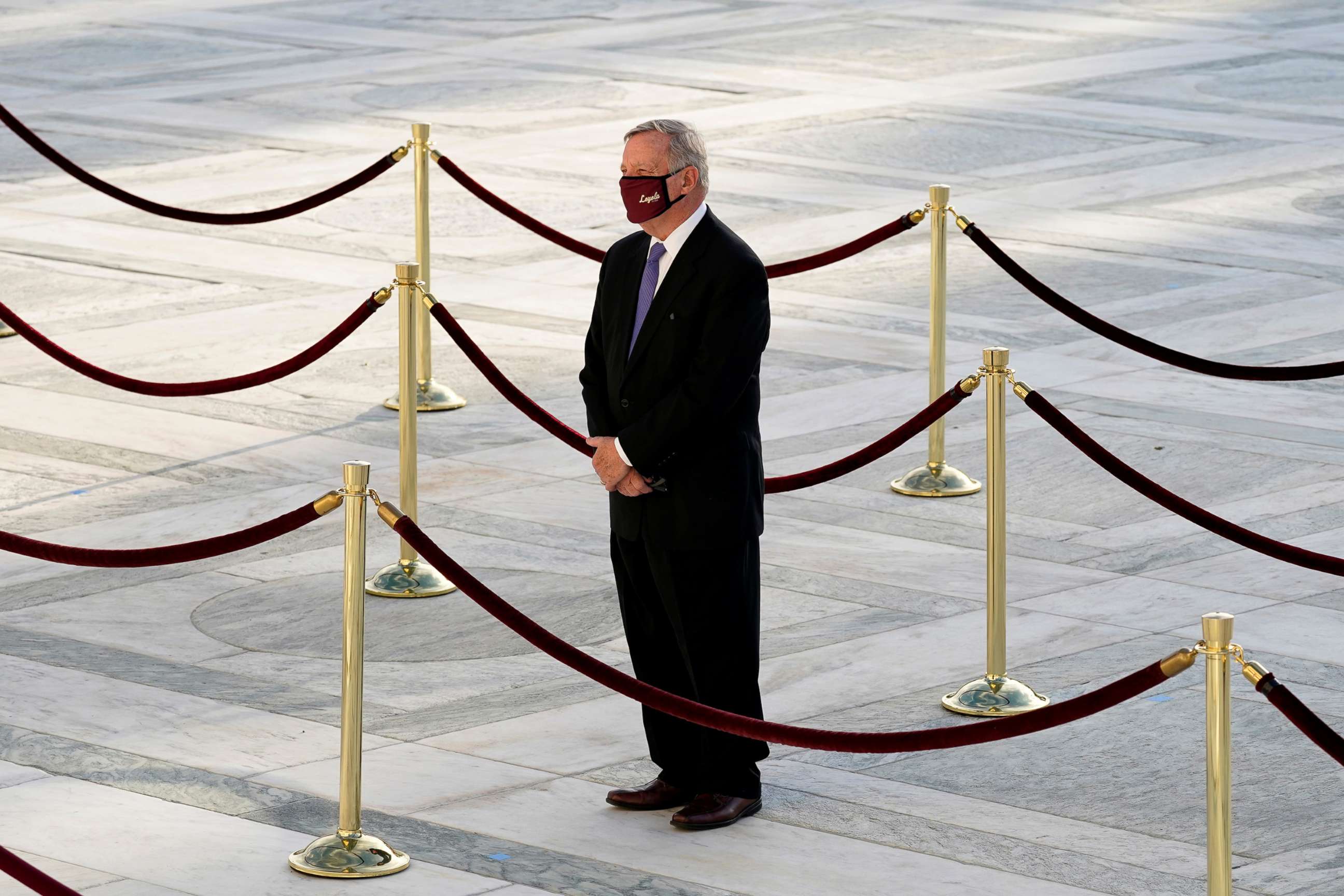 PHOTO: Sen. Dick Durbin pays his respects as Justice Ruth Bader Ginsburg lies in repose under the Portico at the top of the front steps of the U.S. Supreme Court building in Washington, Sept. 23, 2020.