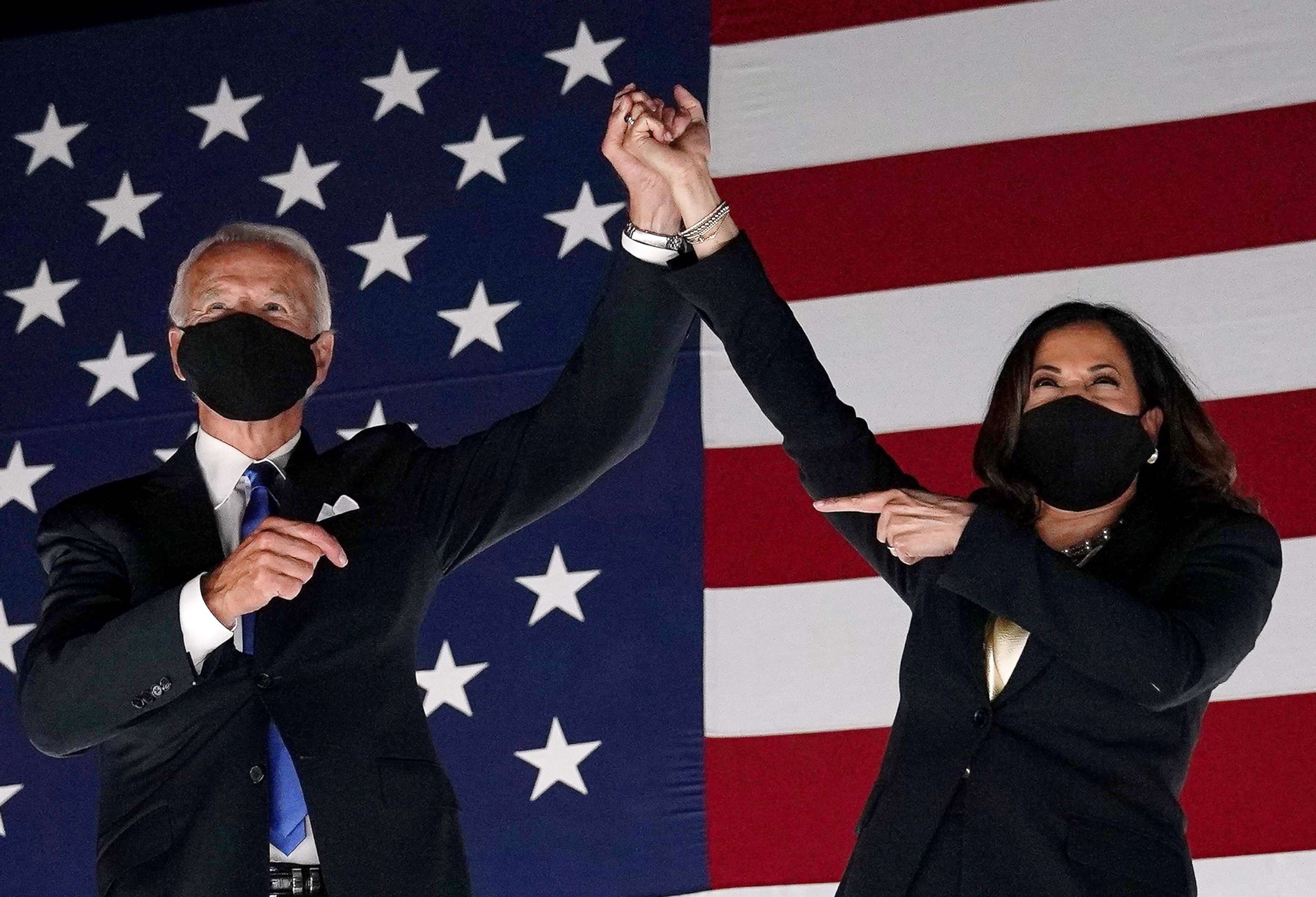 PHOTO: Democratic presidential nominee Joe Biden and Democratic vice presidential nominee Sen. Kamala Harris celebrate with supporters outside the Chase Center in Wilmington, Del., at the conclusion of the Democratic National Convention, Aug. 20, 2020.