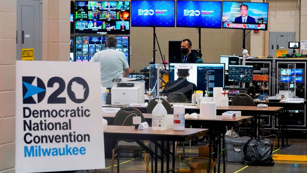 PHOTO: People work in the control room for the Democratic National Convention before the start of the convention at the Wisconsin Center in Milwaukee, Aug. 17, 2020.