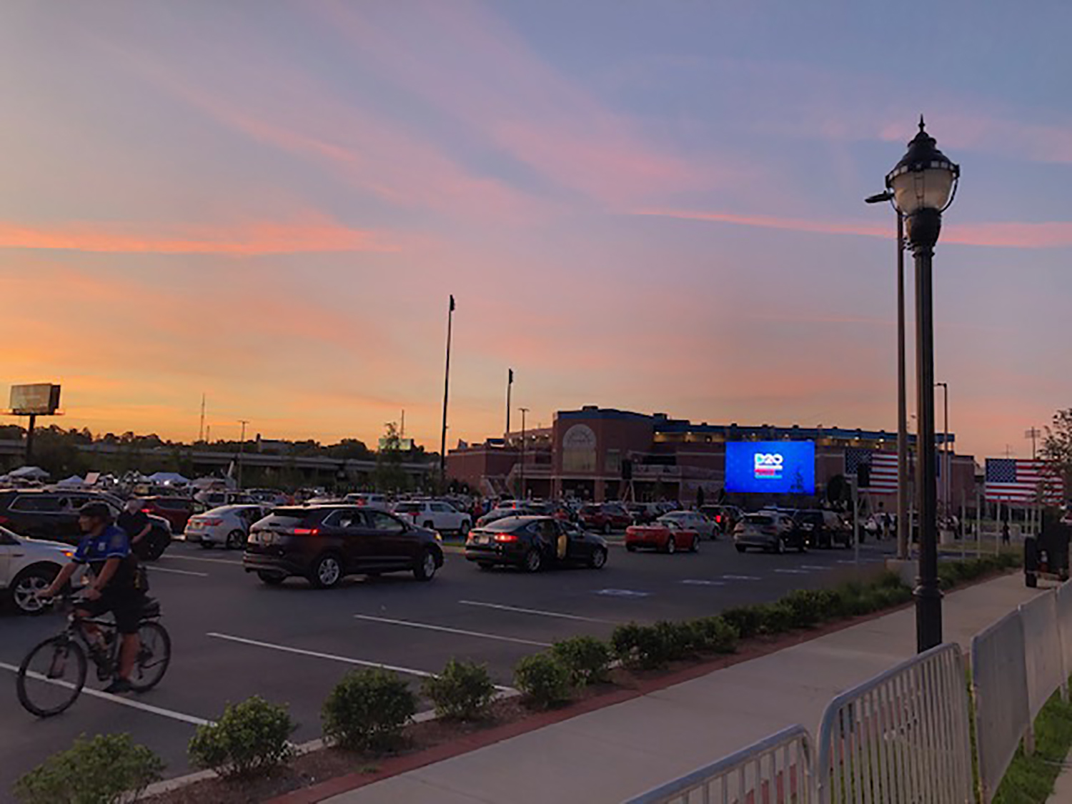PHOTO: Cars arrive for a drive-in watch party outside the Chase Center in Wilmington, Del, on the final night of the 2020 Democratic National Convention.