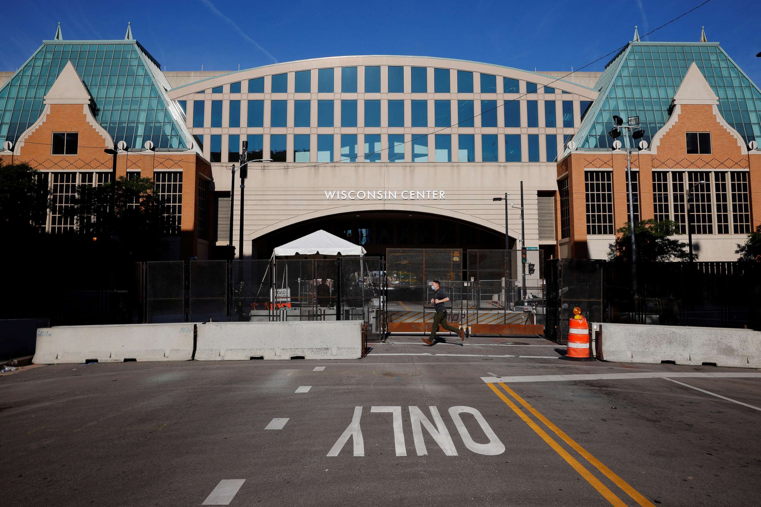 PHOTO: Security fencing surrounds the Wisconsin Center, the site of the Democratic National Convention (DNC), which will be a largely virtual event due to the coronavirus pandemic, in Milwaukee, Aug. 17, 2020.