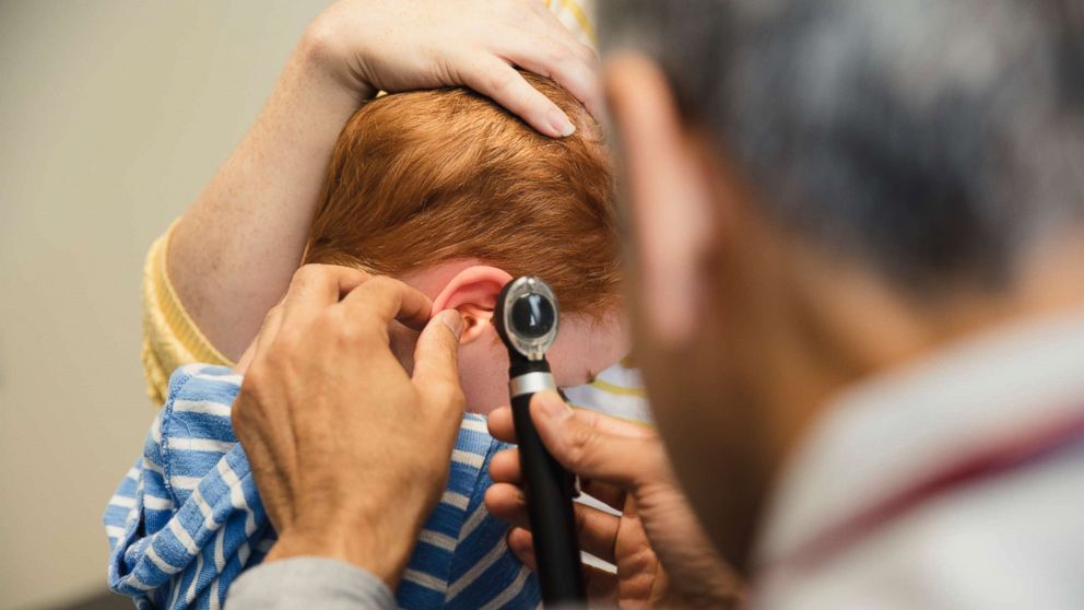 A child is examined by a doctor in an undated stock photo.