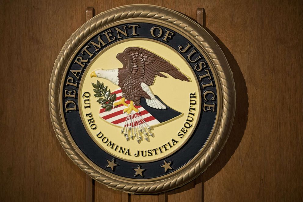 PHOTO: The Department of Justice seal is displayed on a podium during a news conference at the U.S. Attorney's Office in New York, July 2, 2020.